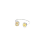 18ct white gold open ring featuring oval and cushion cut yellow diamonds with white diamond surrounds and round brilliant cut accents.