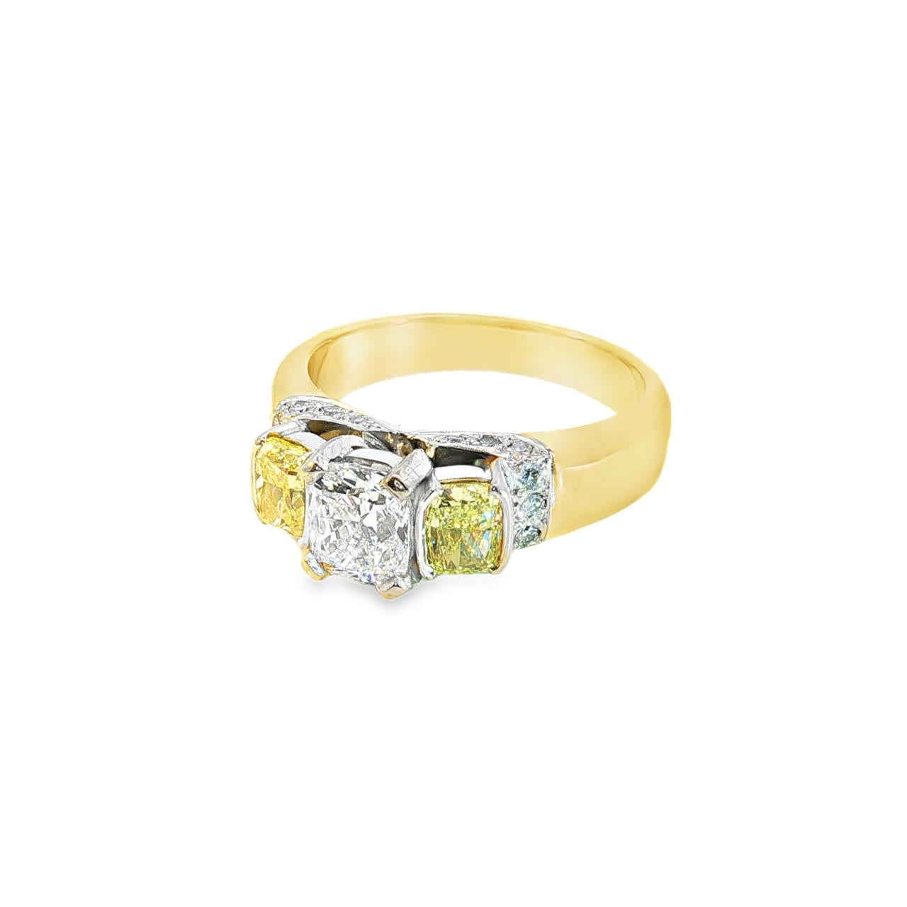 18ct yellow and white gold diamond ring featuring a 0.91ct cushion cut centre diamond with Fancy Yellow side diamonds and round diamond accents.