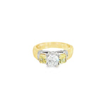18ct yellow and white gold diamond ring featuring a 0.91ct cushion cut centre diamond with Fancy Yellow side diamonds and round diamond accents.