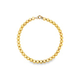 Yellow gold bracelet featuring polished 5mm ball links and a bolt ring clasp.