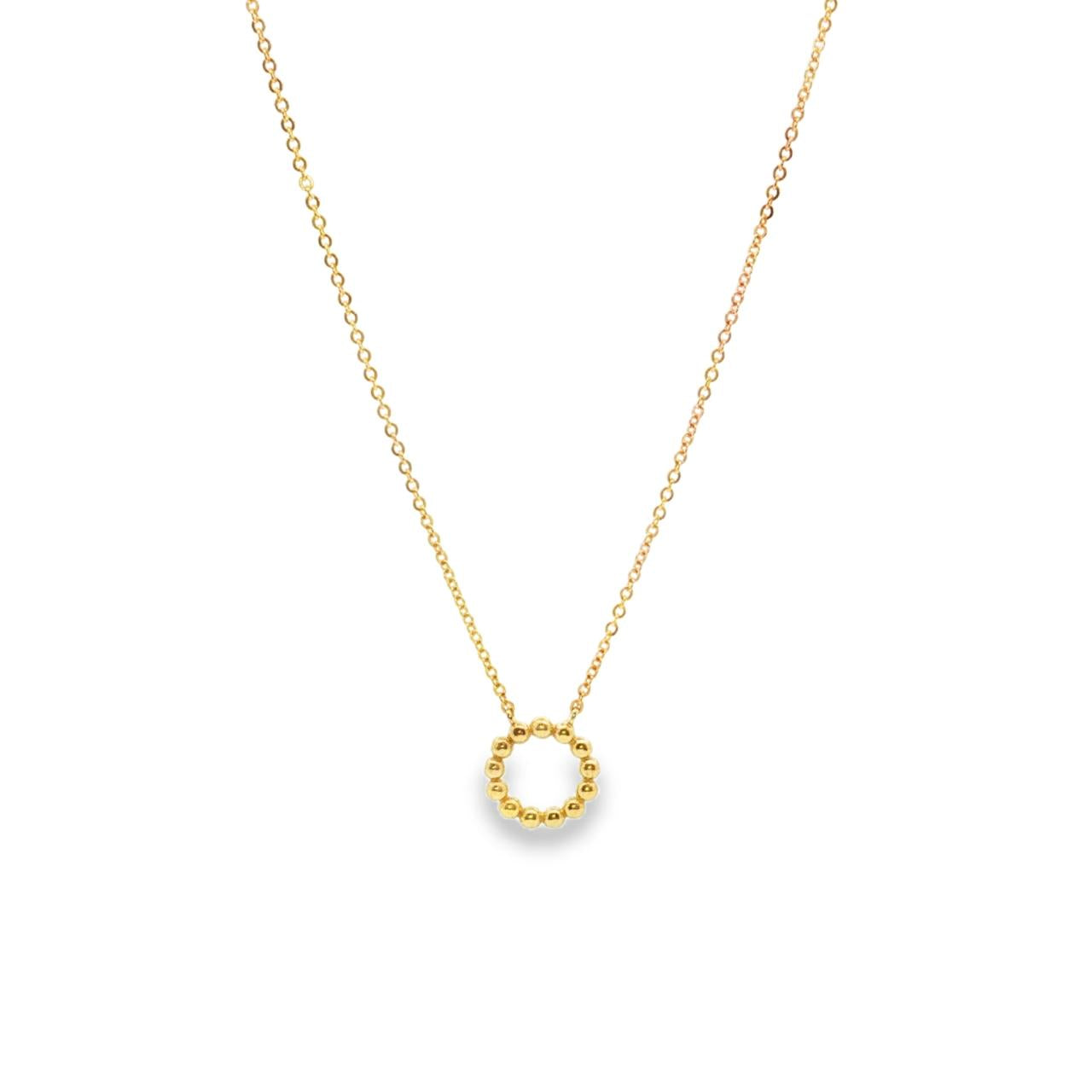 9ct yellow gold necklet with beaded open circle pendant on a trace link chain.
