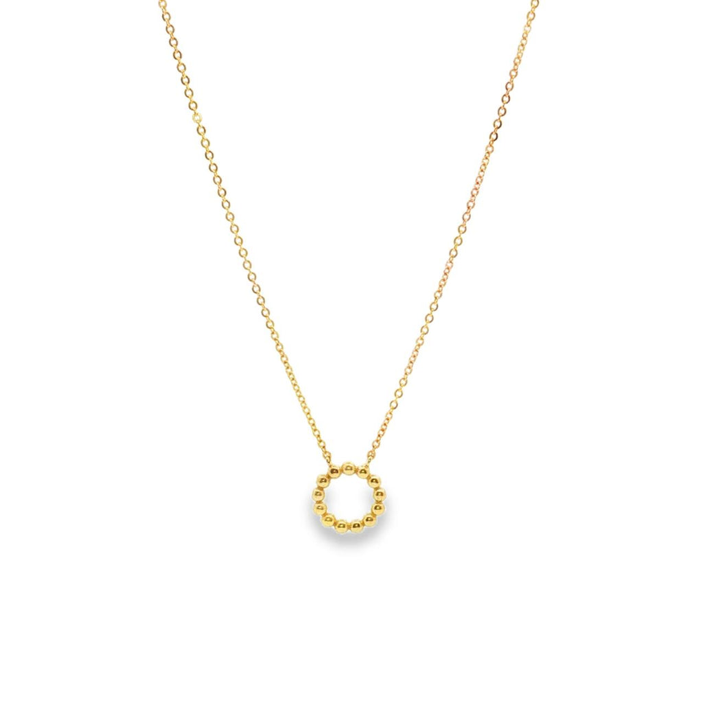 9ct yellow gold necklet with beaded open circle pendant on a trace link chain.
