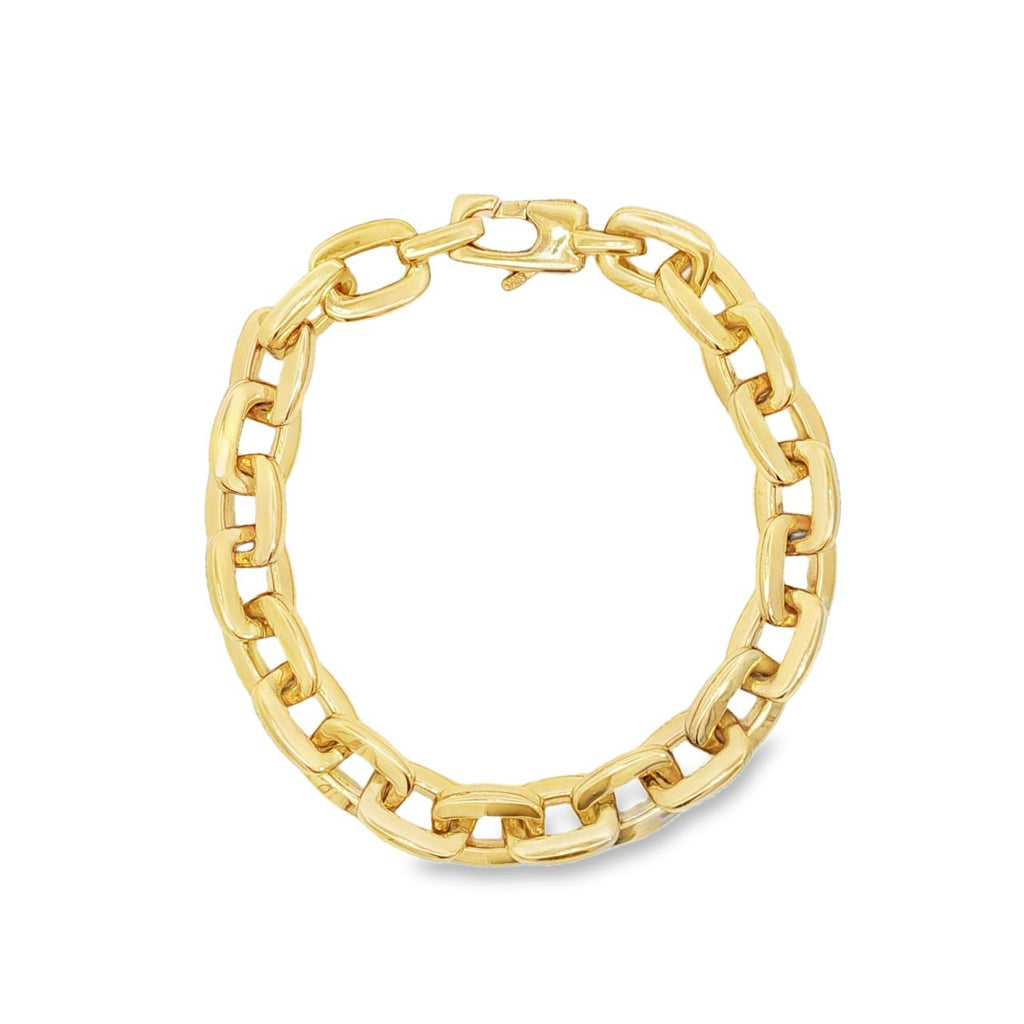 Yellow gold bracelet featuring softly rounded cushion-shaped links and a decorative rectangular clasp.