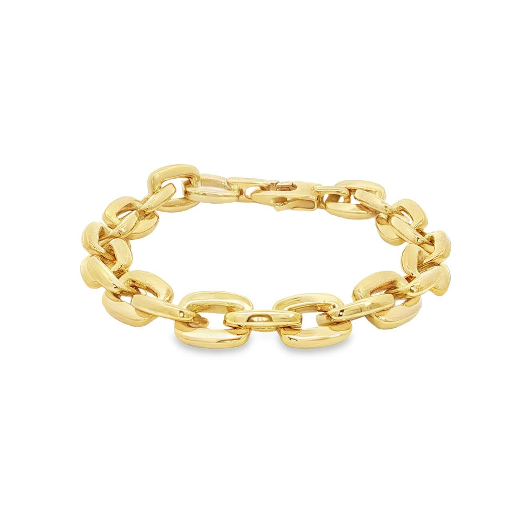 Yellow gold bracelet featuring softly rounded cushion-shaped links and a decorative rectangular clasp.
