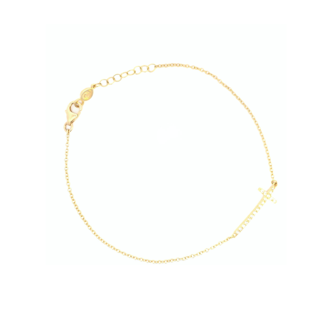 18ct yellow gold fine trace link bracelet featuring a horizontal diamond-set cross with 18 round brilliant cut diamonds and parrot clasp.
