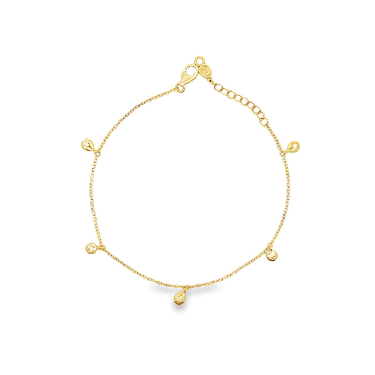 18ct yellow gold fine trace link bracelet with five pear-shaped diamond drops spaced along the length, finished with a parrot clasp.