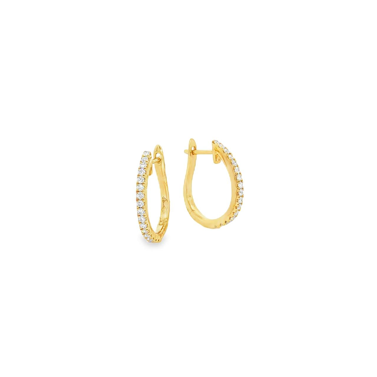 18ct yellow gold oval huggie earrings with claw-set diamonds down the front.