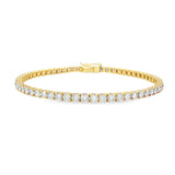 18ct yellow gold diamond tennis bracelet with round brilliant cut diamonds in four-claw settings.