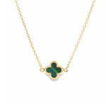 9ct yellow gold trace chain necklace with small green clover pendant.