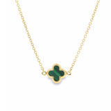 9ct yellow gold trace chain necklace with small green clover pendant.