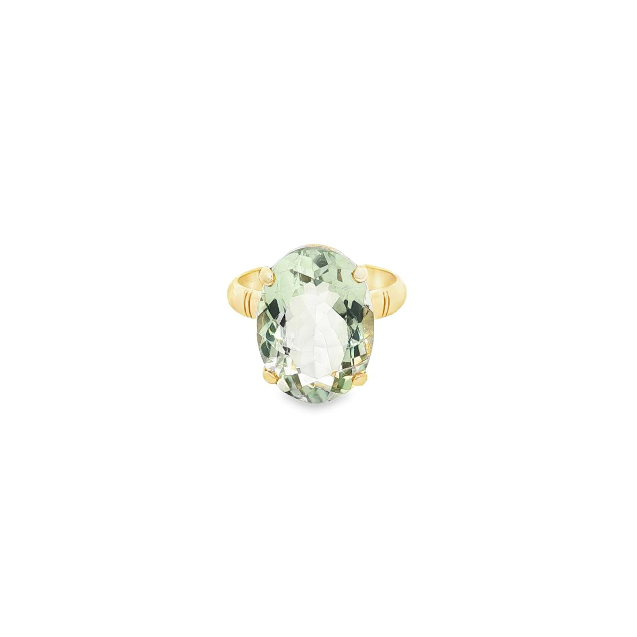 9ct yellow gold ring with large oval green quartz prasiolite in four-claw setting.