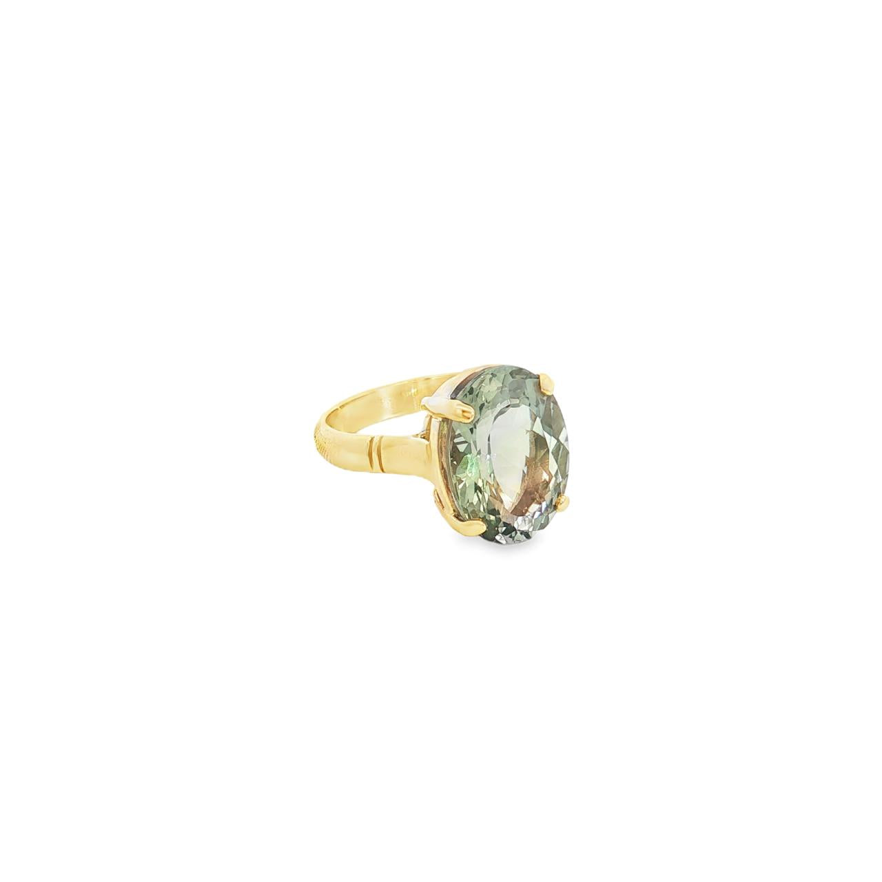 9ct yellow gold ring with large oval green quartz prasiolite in four-claw setting.