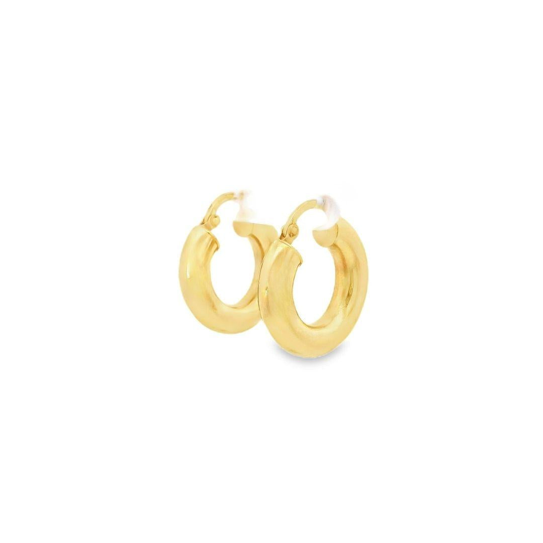 18ct yellow gold hoop earrings featuring a polished 10 x 4.70mm rounded design with secure clip fittings.