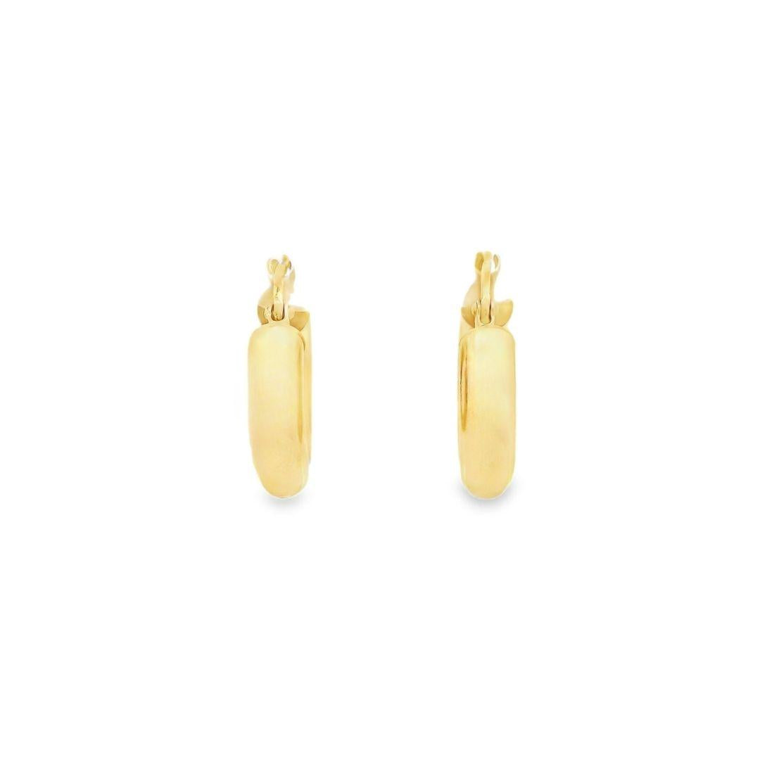 18ct yellow gold hoop earrings featuring a polished 10 x 4.70mm rounded design with secure clip fittings.