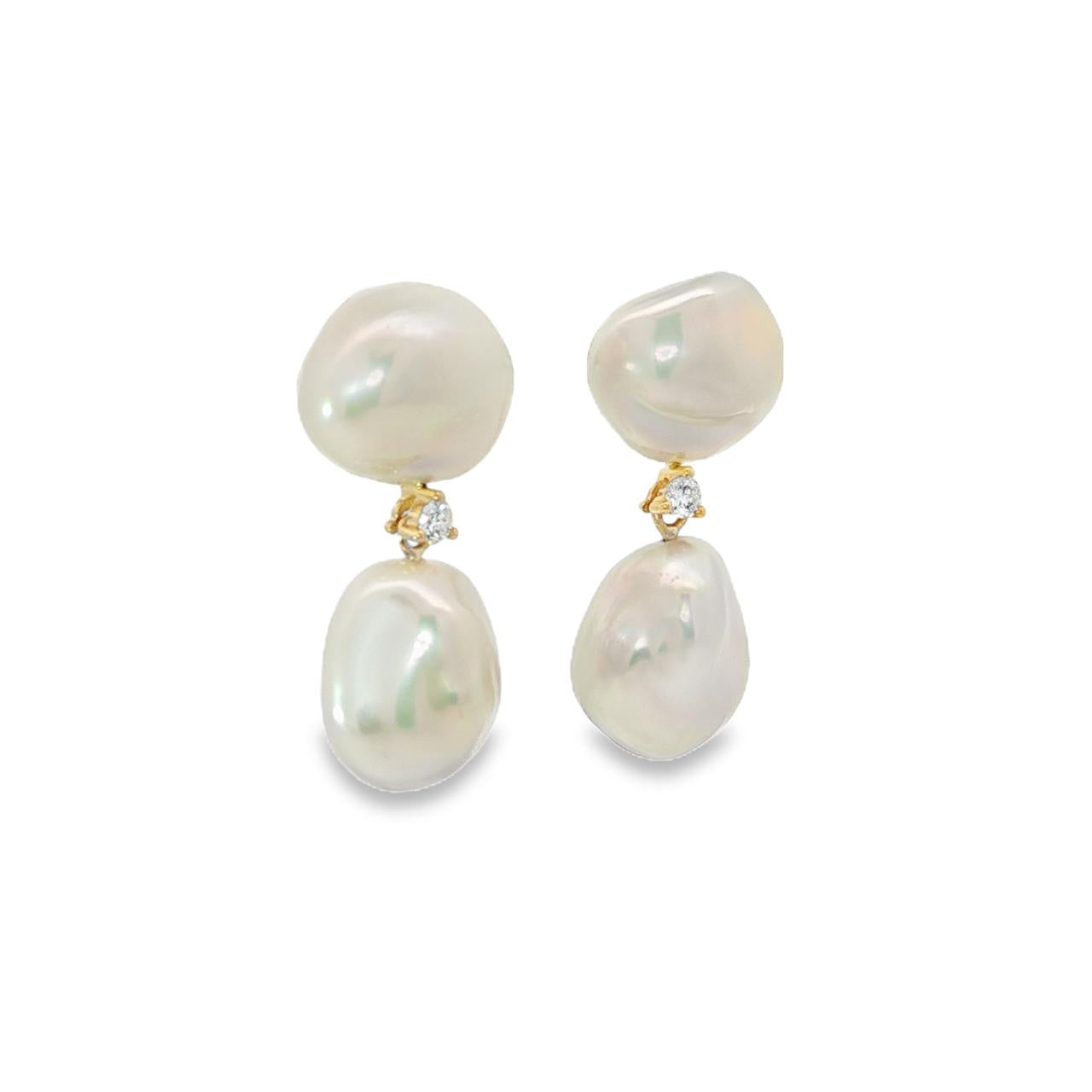 18ct yellow gold double drop keshi pearl earrings with central claw-set diamond.