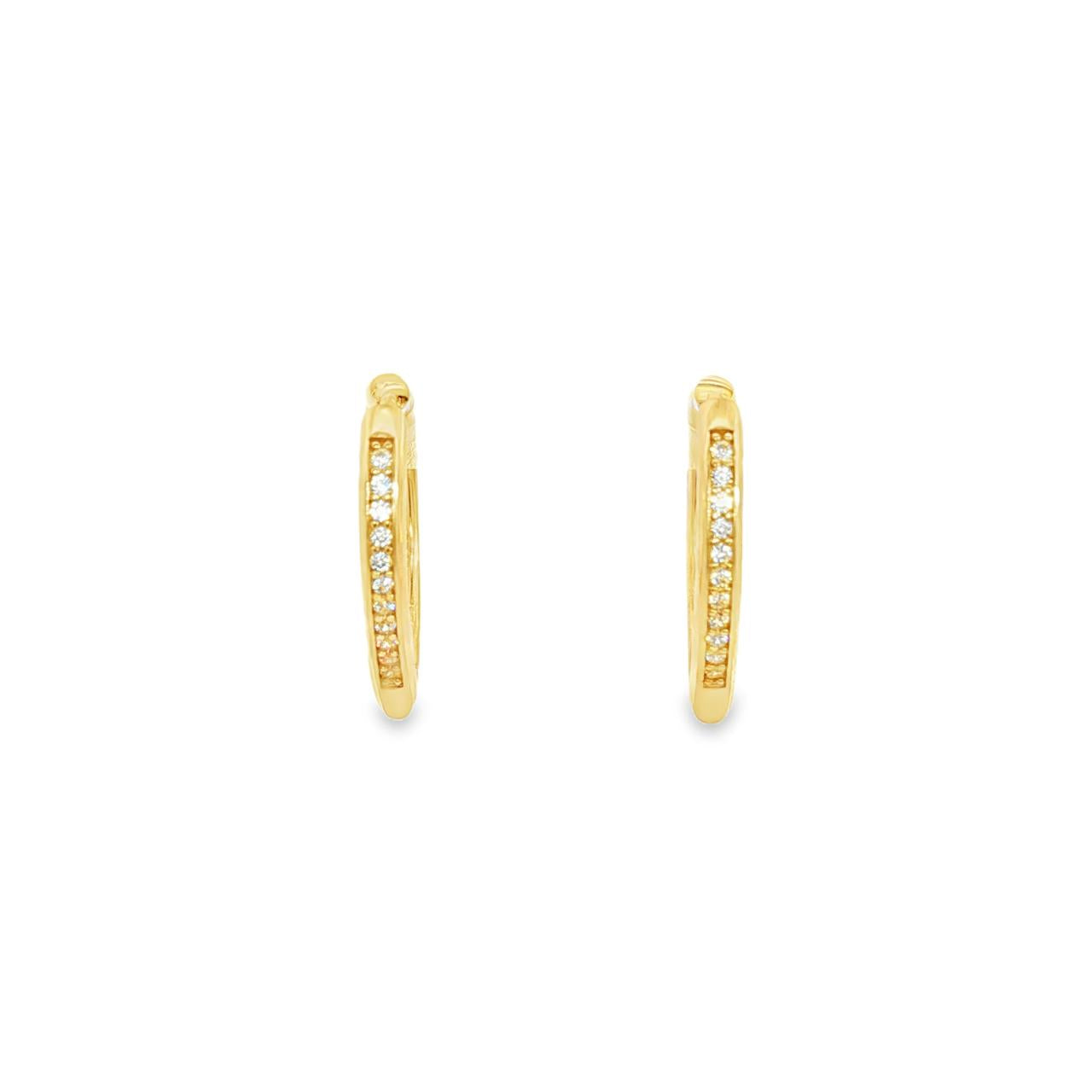 9ct yellow gold marquise-shaped huggie earrings with cubic zirconias down the front.