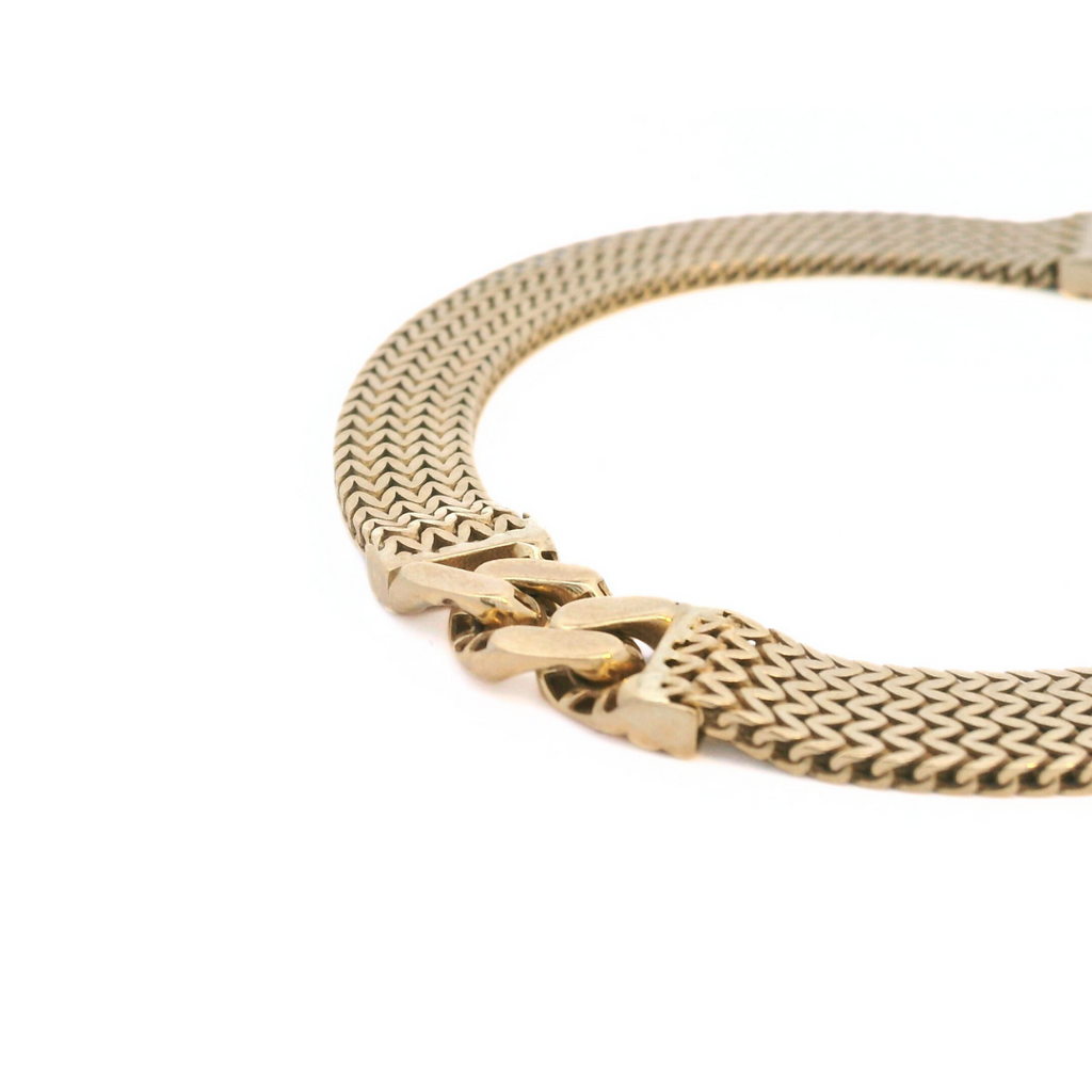 9ct yellow gold bracelet with flexible 7.3mm wide mesh link design and double curb link centre, finished with a bolt ring clasp.