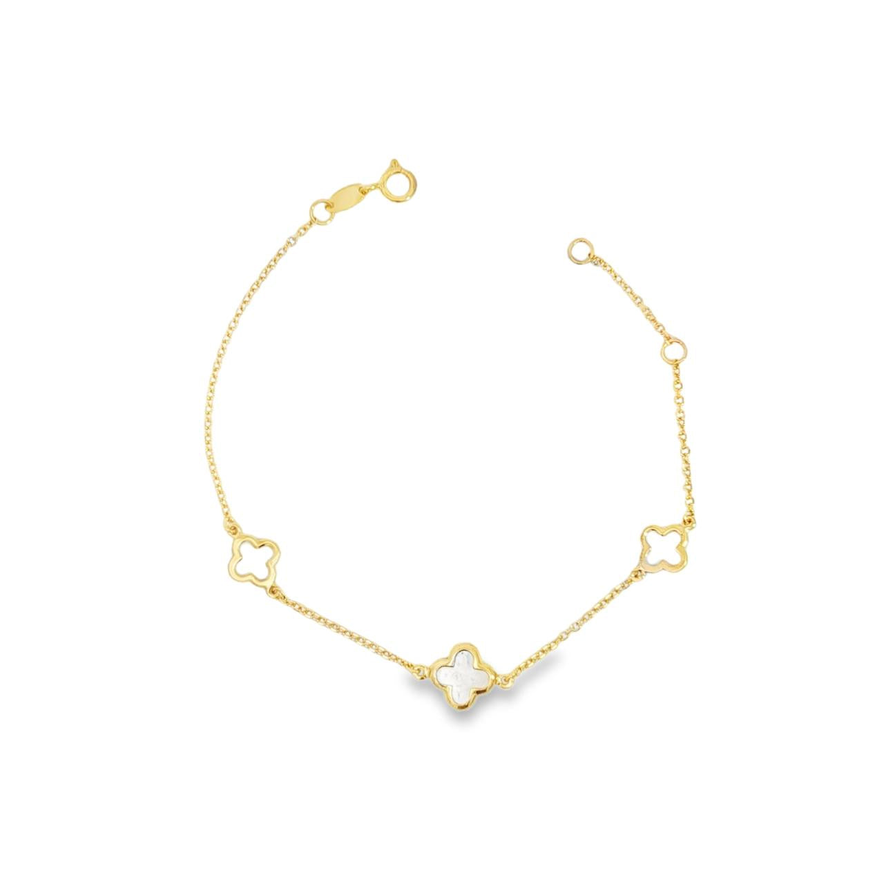 9ct yellow gold trace link bracelet with mother of pearl clover centre and open clover details.