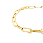 9ct yellow gold bracelet featuring 11 x 4.5mm oblong oval paperclip links and a fancy clasp with a polished finish.