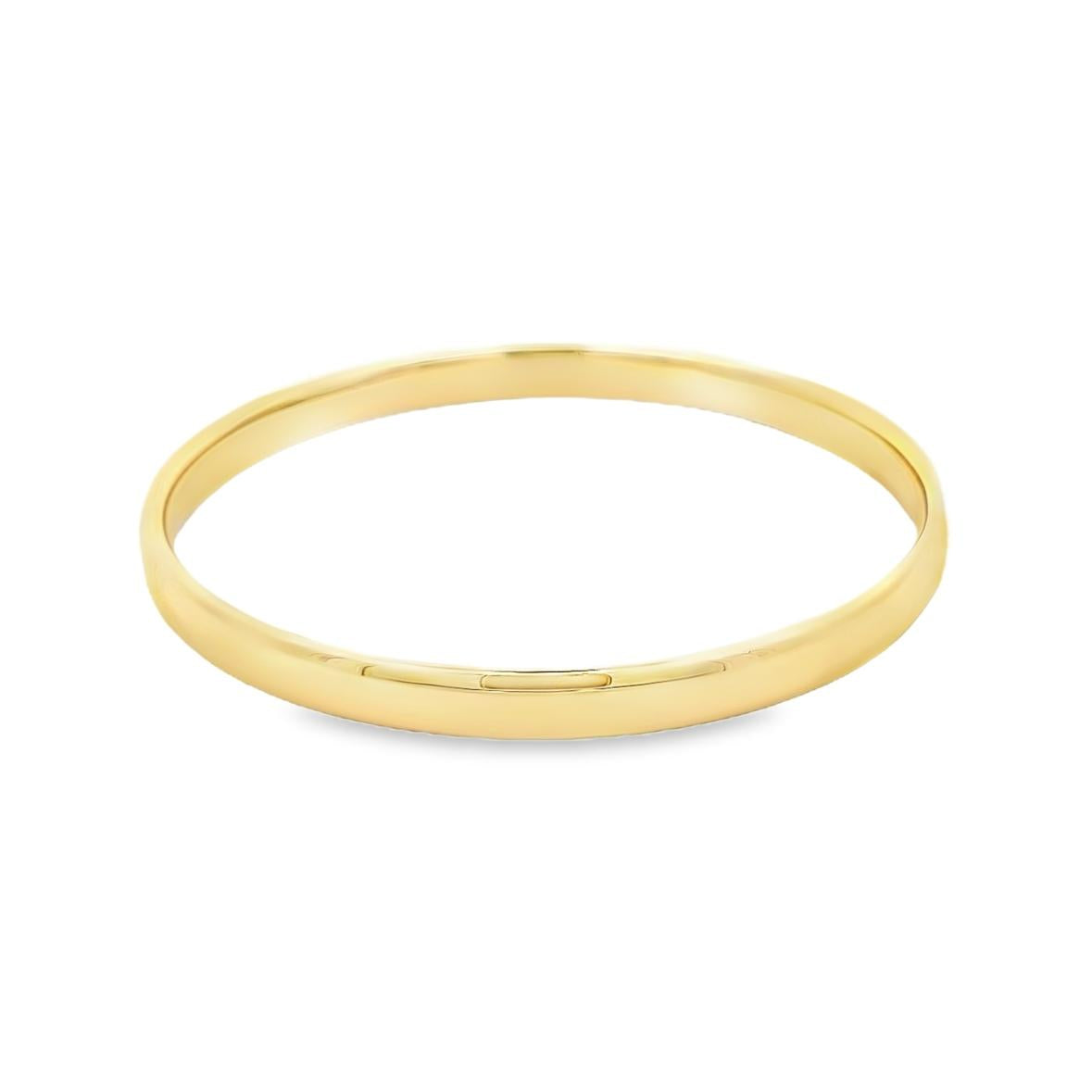 9ct yellow gold 6mm silver filled golf bangle with rounded polished profile.