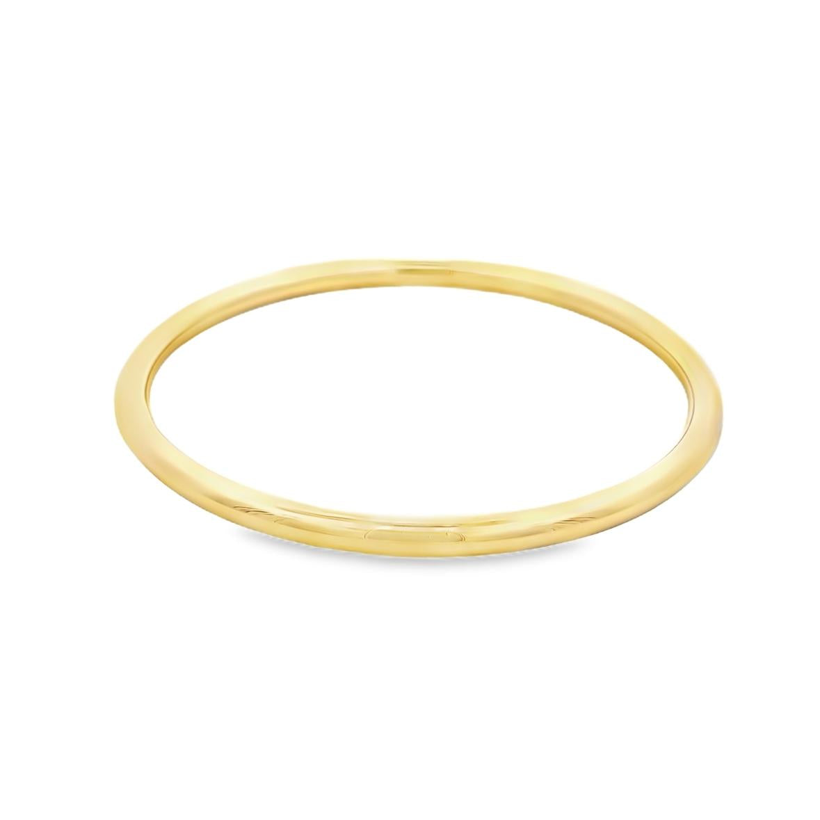 Yellow gold silver filled golf style bangle with polished finish.