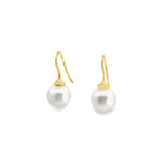 18ct yellow gold hook earrings with tapered caps and 10mm South Sea pearls.