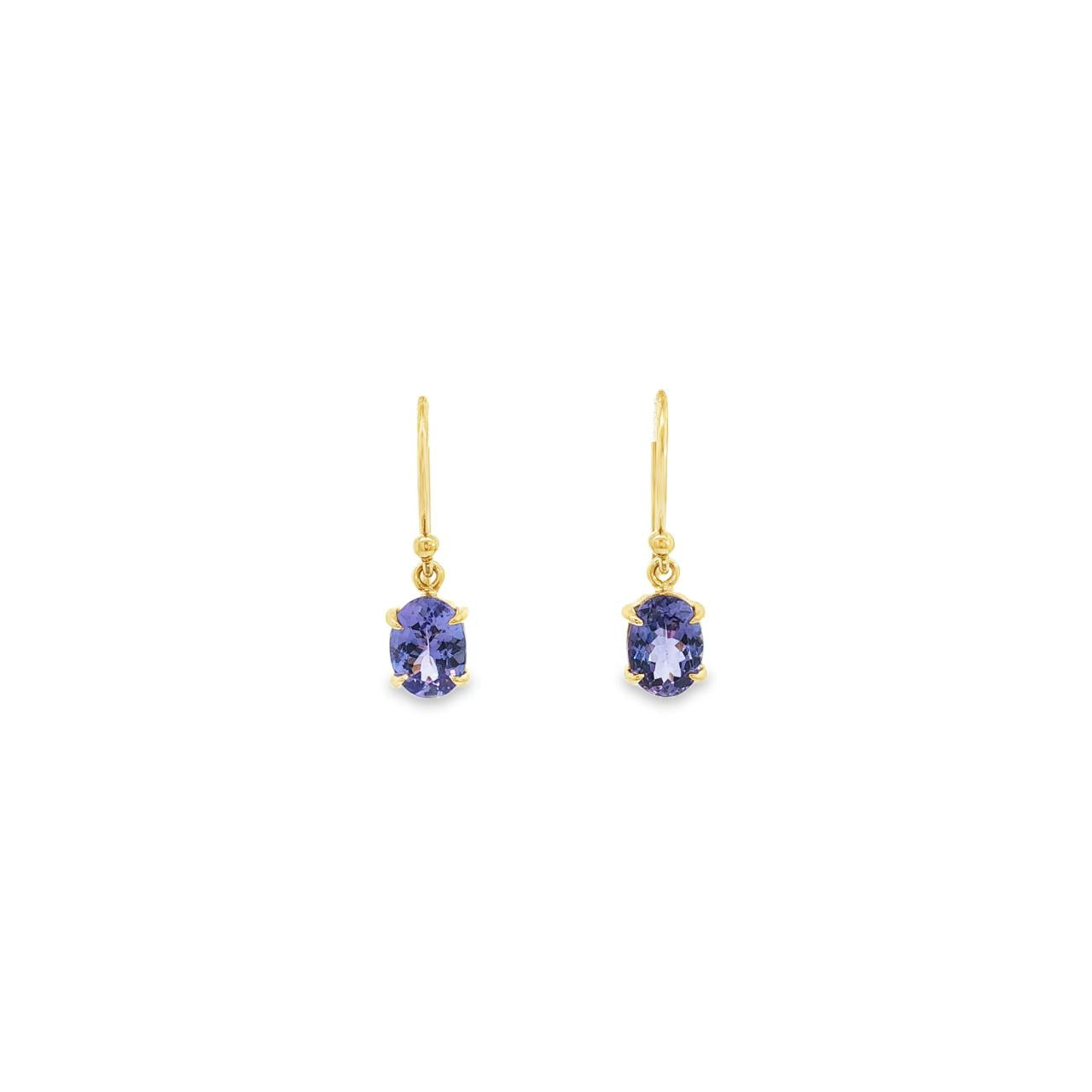 9ct yellow gold oval tanzanite drop earrings with four-claw settings.