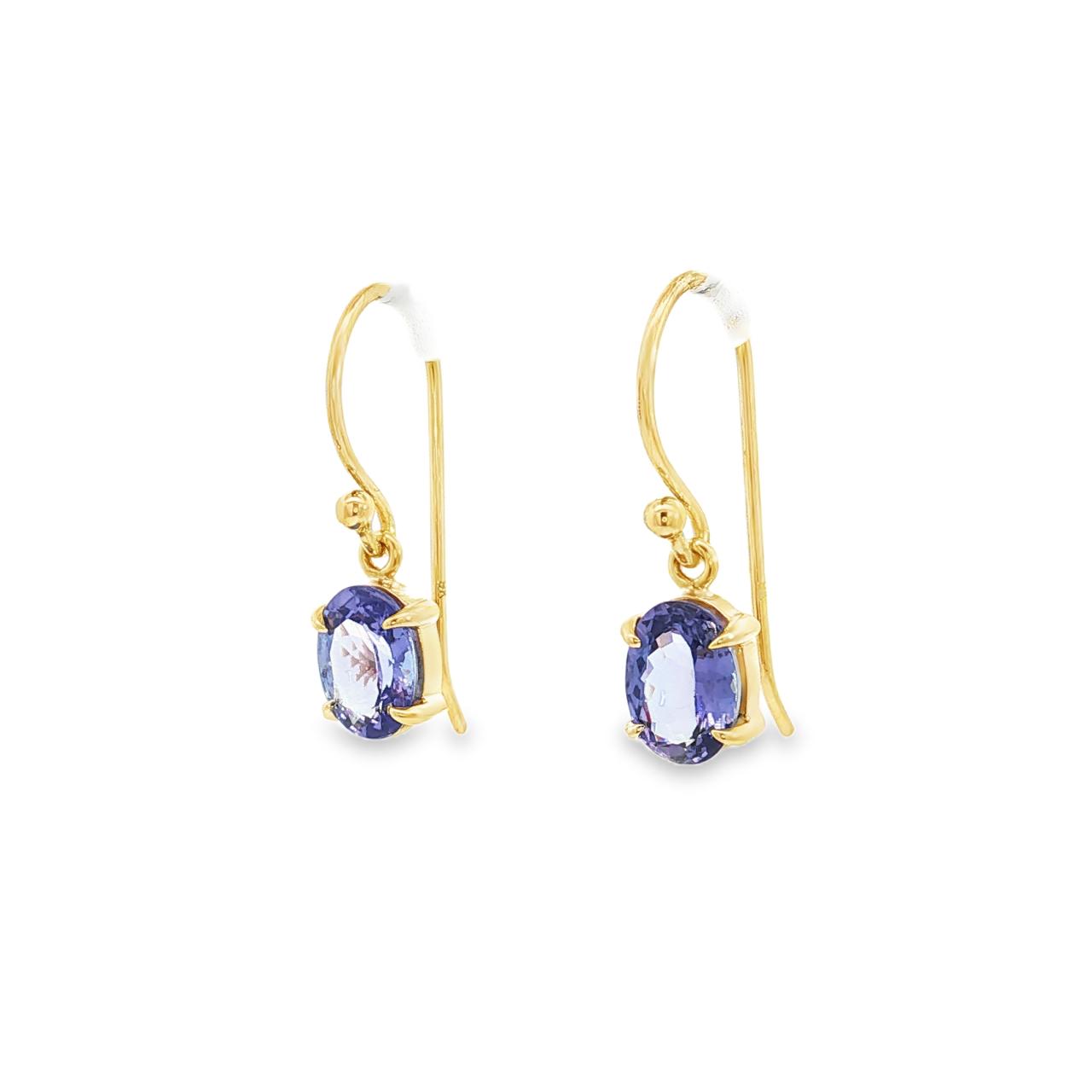 9ct yellow gold oval tanzanite drop earrings with four-claw settings.
