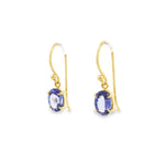 9ct yellow gold oval tanzanite drop earrings with four-claw settings.