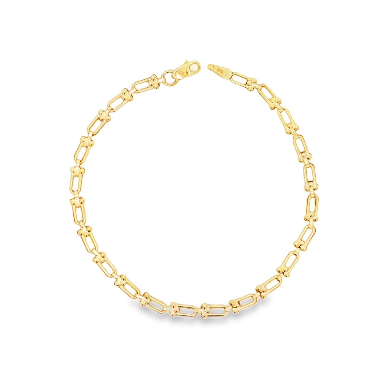 9ct yellow gold bracelet with U-shaped links and cluster bead detailing.