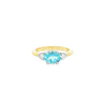 9ct yellow and white gold ring with 1.27ct horizontal oval aquamarine and triangular diamond accents.