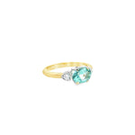 9ct yellow and white gold ring with 1.17ct horizontal oval green beryl and triangular diamond accents.