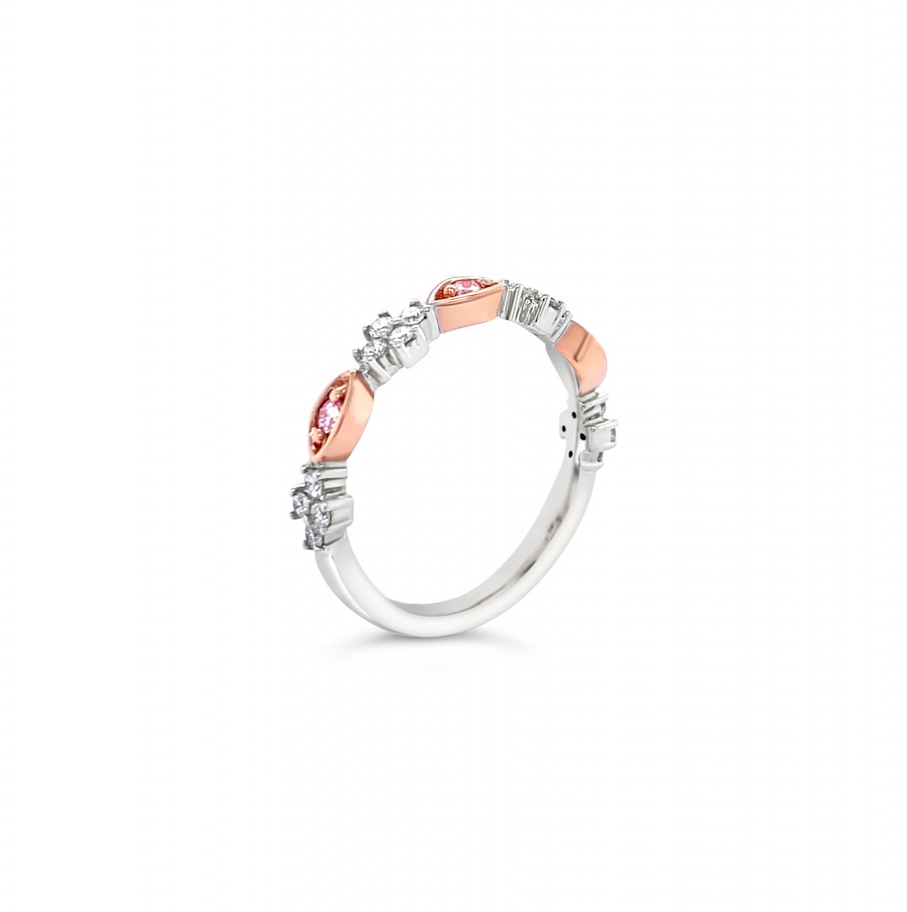 18ct white and rose gold ring featuring Argyle pink and white diamonds totalling 0.29ct in alternating marquise bead and cluster claw settings.