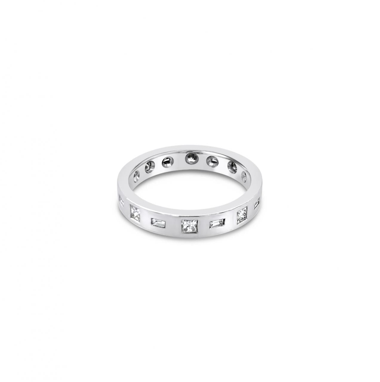 18ct white gold wedding ring featuring alternating baguette and princess cut diamonds totalling 0.19ct, pressure set into a flat 2.1mm band.