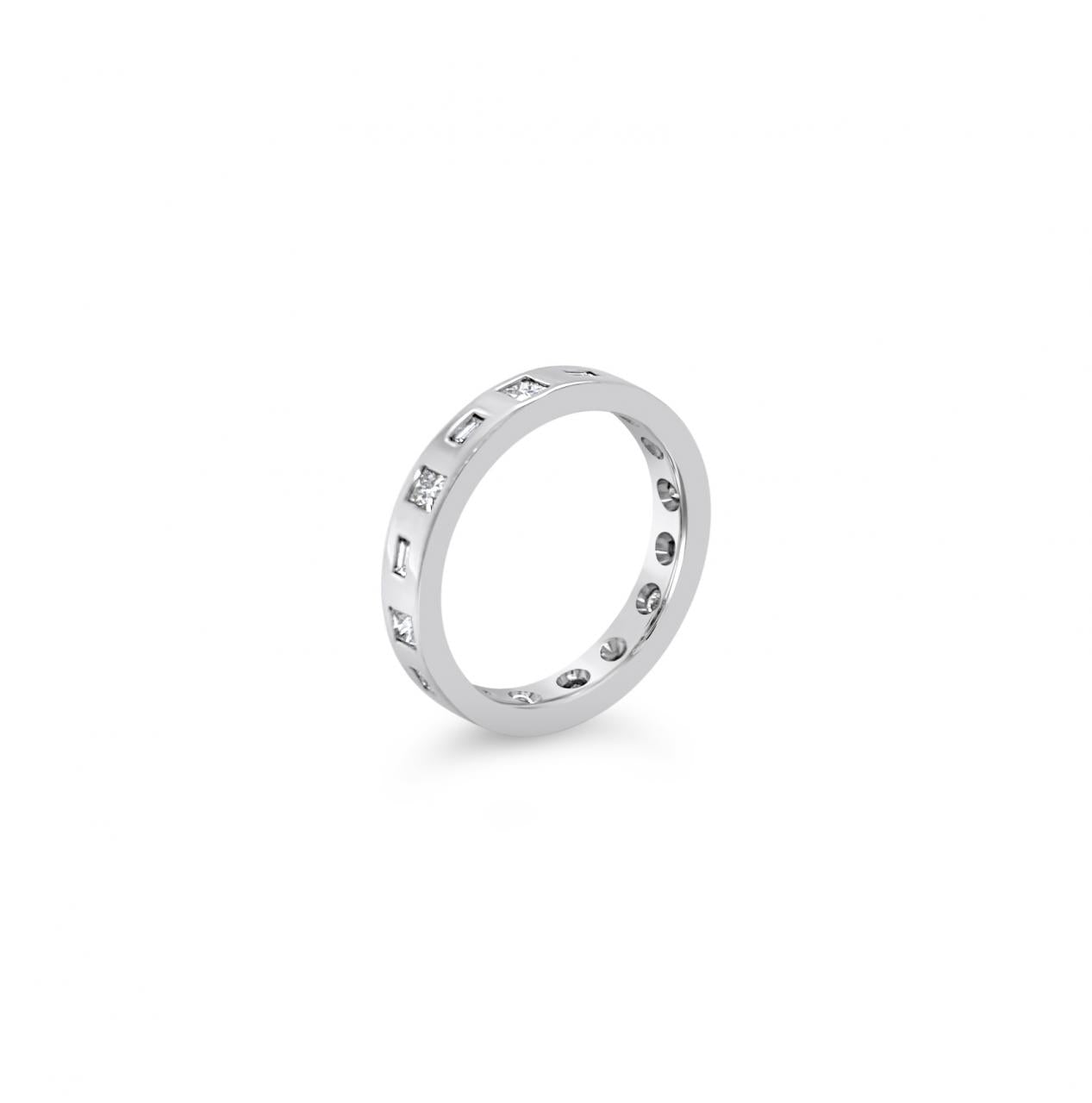 18ct white gold wedding ring featuring alternating baguette and princess cut diamonds totalling 0.19ct, pressure set into a flat 2.1mm band.