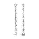 18ct white gold diamond drop earrings with 16 individually bezel-set round brilliant cut diamonds, G–H colour, VS–SI clarity, and post and butterfly fittings.