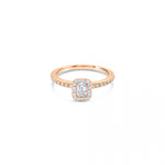 An 18ct rose gold diamond halo ring with an emerald cut central diamond and a halo of round diamonds around it.