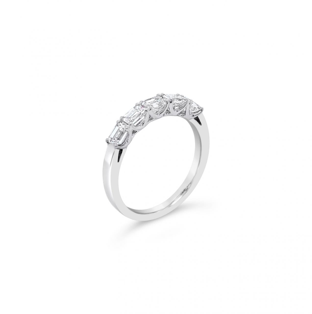 18ct white gold ring featuring five horizontally set emerald cut diamonds totalling 0.92ct in refined claw settings.