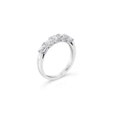 18ct white gold ring featuring five horizontally set emerald cut diamonds totalling 0.92ct in refined claw settings.