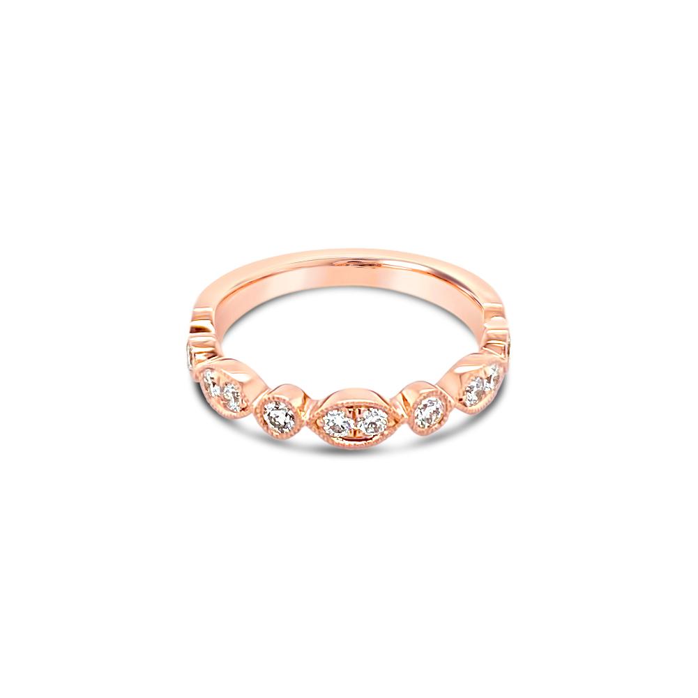 18ct rose gold diamond ring featuring ten round brilliant cut diamonds totalling 0.32ct in alternating marquise and round-shaped settings across the top.
