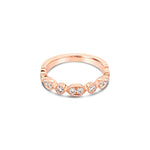 18ct rose gold diamond ring featuring ten round brilliant cut diamonds totalling 0.32ct in alternating marquise and round-shaped settings across the top.