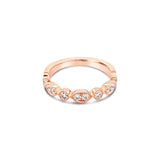 18ct rose gold diamond ring featuring ten round brilliant cut diamonds totalling 0.32ct in alternating marquise and round-shaped settings across the top.
