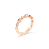 18ct rose gold diamond ring featuring ten round brilliant cut diamonds totalling 0.32ct in alternating marquise and round-shaped settings across the top.