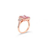 18ct rose gold ring featuring a 2.60ct emerald-cut morganite with dome-shaped diamond clusters and bead-set diamond shoulders.