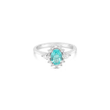 18ct white gold Paraiba tourmaline and diamond ring featuring a 0.67ct oval-cut centre stone, halo surround, and pear-cut diamonds on either side.