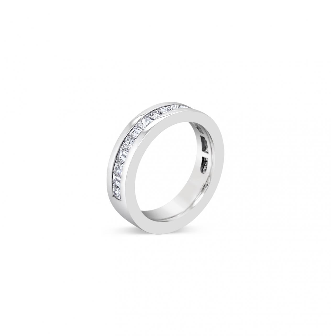 18ct white gold wedding ring featuring alternating princess and baguette cut diamonds totalling 1.25ct in a channel-set design.