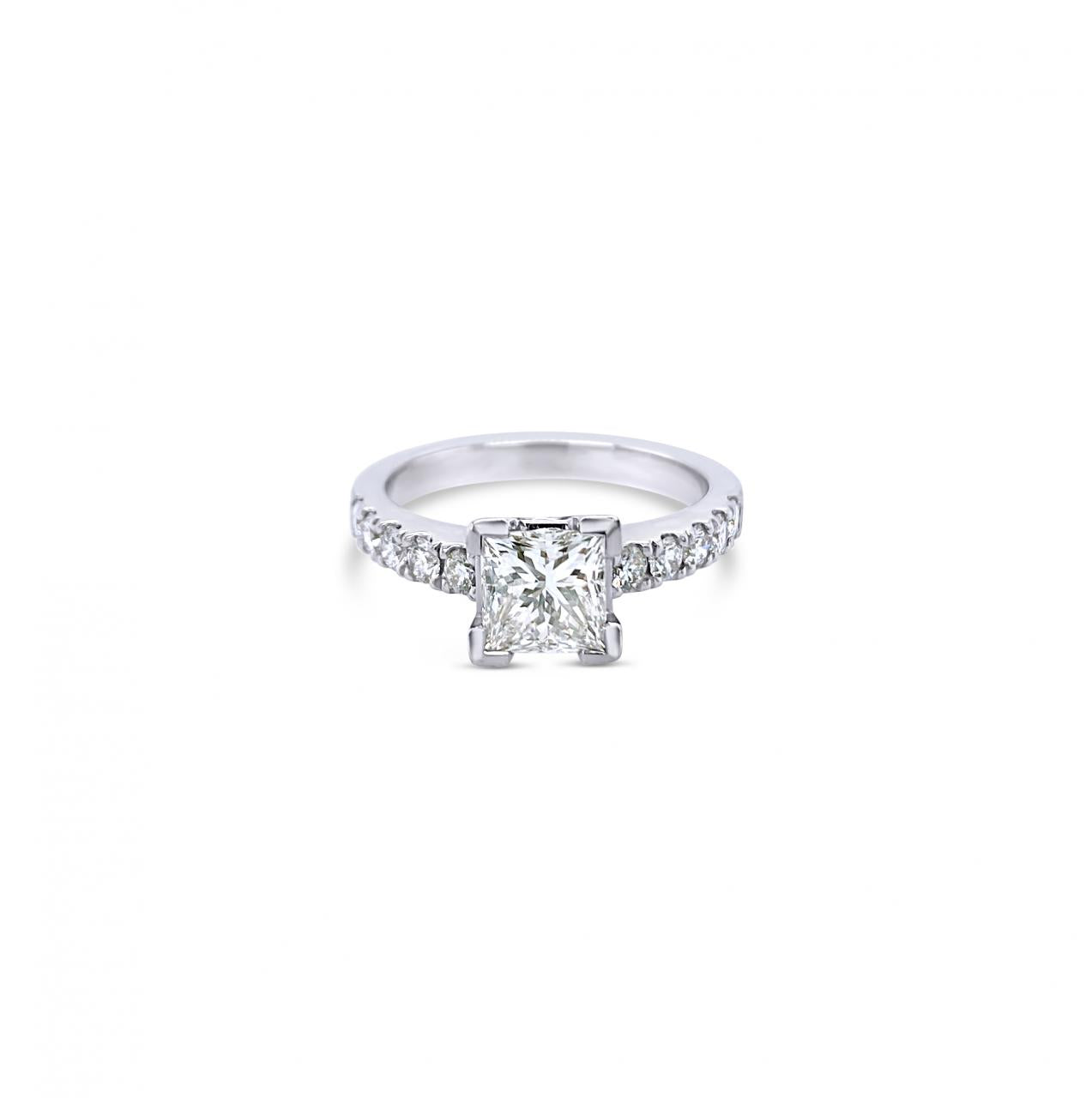 Platinum diamond ring featuring a 1.01ct princess cut centre diamond with corner-claw setting and claw-set diamond shoulders.