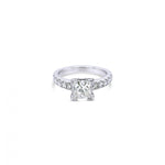 Platinum diamond ring featuring a 1.01ct princess cut centre diamond with corner-claw setting and claw-set diamond shoulders.