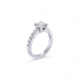 Platinum diamond ring featuring a 1.01ct princess cut centre diamond with corner-claw setting and claw-set diamond shoulders.