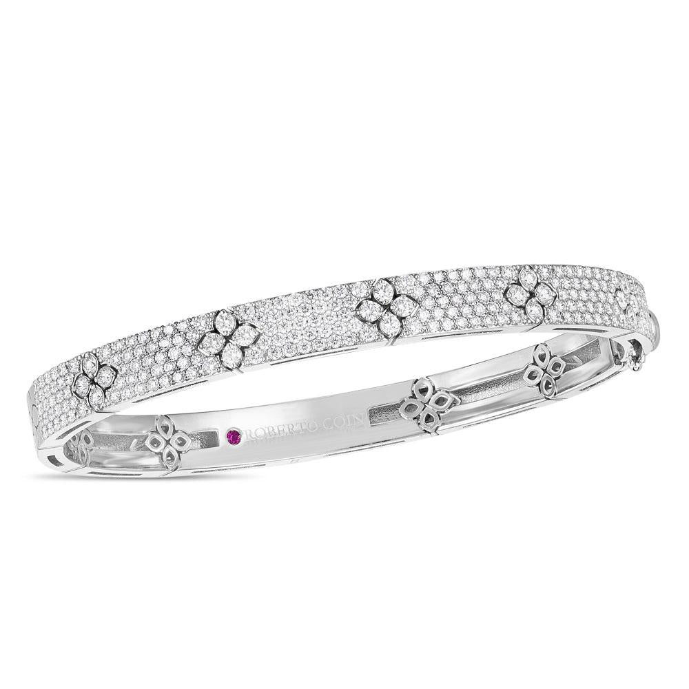 Roberto Coin Love in Verona 18ct white gold diamond bangle with pavé flower motifs and signature hidden rubies inside the clasp.